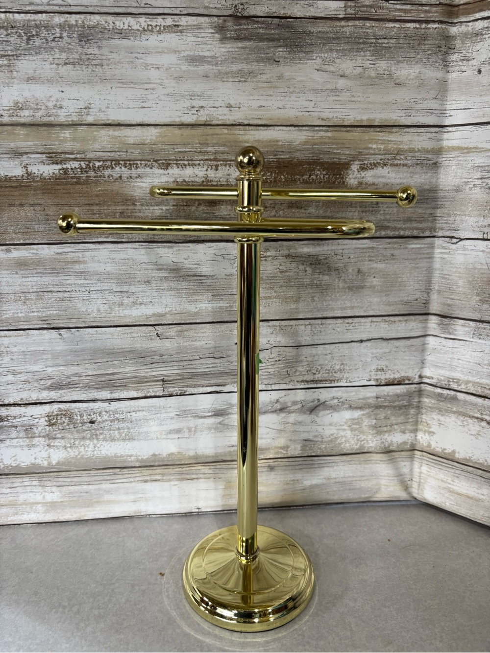 Brass/gold coloured metal hand towel holder for bathroom